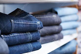 Jeans clothes on shelf in shop