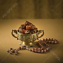 Dates bowl and rosary
