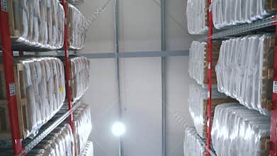 Aisle between the warehouse shelves