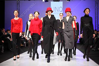 Models wear fashions by UNQ walk catwalk
