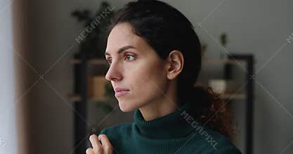Lonely woman looks pensive deep in anxious thoughts