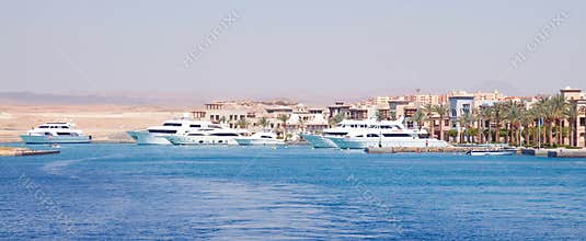 Port with stunning luxurious white yachts, Egypt