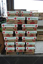 Stacks of Cartons filled with Tomatoes
