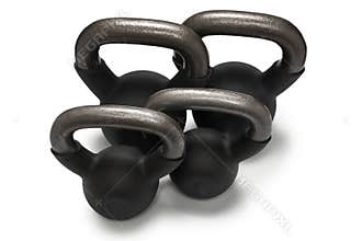 Black weight isolated on white. 4 kg weight. Fitness for women