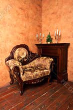 Old-fashioned interior with luxury armchair