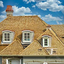 Housing Market Custom Home New Cedar Shake Roof Summer Sky Background