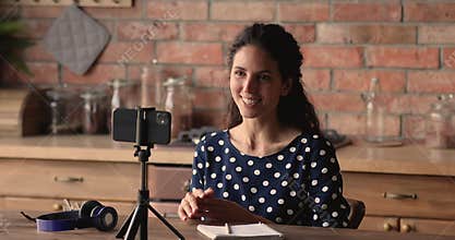 Woman use smartphone record motivational speech for audience