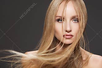 Beautiful fashion model woman with long shiny hair