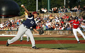 Baseball pitcher throwing ball