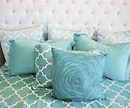 Teal cushions and bedding textiles