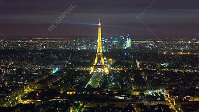 View of Paris and Eiffel Tower from Montparnasse tower timelapse at night, France