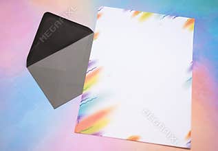 Letterhead with colored borders on a rainbow-colored background