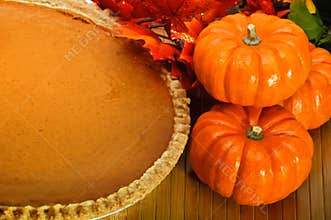 Pumpkin pie with pumpkins.