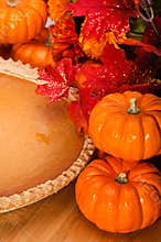 Pumpkin pie with pumpkins.