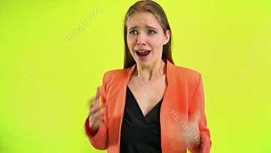 Scared woman screaming horror in space studio over yellow