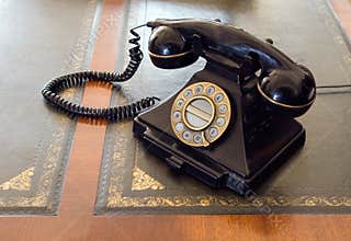 Vintage telephone on desk.