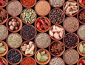 Seamless texture of spices on black