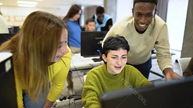 Young classmates studying together inside classroom
