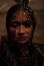 Depression girl covered with water while crying in the bathroom alone