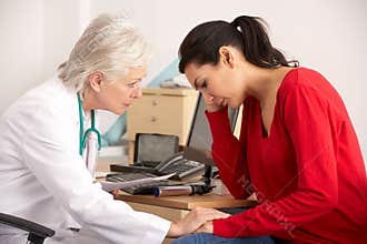 American doctor with depressed woman patient