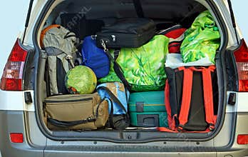 Very car with the trunk full of luggage