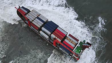 Container ship, which ran aground during a storm. Shipwreck. Giant waves