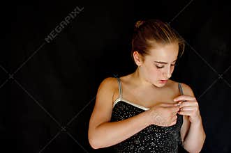 Pensive ballerina backstage