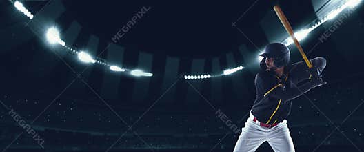 Flyer with professional baseball player with baseball bat in action during match in crowed sport stadium at evening time