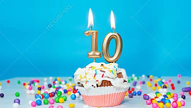 Beautiful birthday greetings to a ten-year-old child on a blue background, card for 10 years happy birthday copy space. Festive