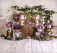 Purple lavender spring sett up with colourful flowers pink , purple, vintage wood parquet