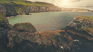 Sun ocean coast with people at island aerial. Nature landscape. Tourist attraction. Serene seascape