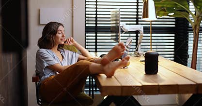Woman talking to the smart speaker indoors