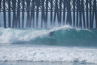 Surfer enjoying the barrel