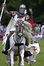 Knights jousting warwick castle England uk