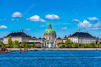 Frederik\'s Church known as The Marble Church and Amalienborg palace with the statue of King Frederick V in Copenhagen, Denmark