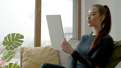 Female Communicate With Family in New Apartment