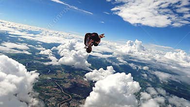 Video of a young woman skydiver jumping from the plane