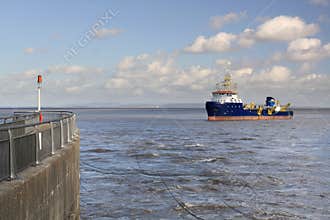 Ship approaching harbour