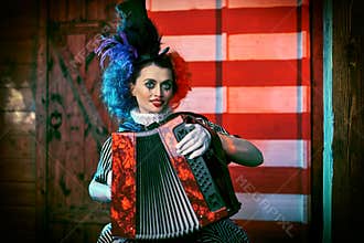 Lovely clown with accordion