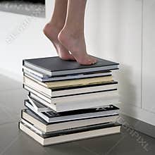 Reaching a book in the library
