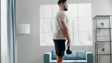 Professional sportsman with beard exercises deadlift