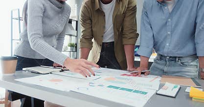 Asian business financial team work together in project brainstorm meeting. Cooperate teamwork, strategy planning