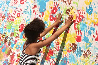 Girl playing with paint