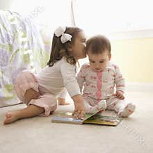 Kids with book.
