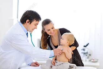 Baby being checked by doctor using stethoscope