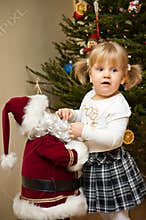 Child and Santa Claus Doll