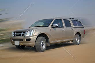 Car 4x4 in the middle of movement blur