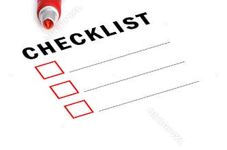 Checklist with red marker and checked boxes.