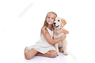 Child with pet puppy dog