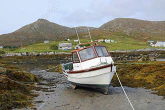 Boat at low tide on Scottish island